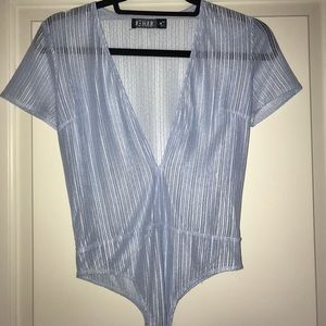 Sheer light blue body suit